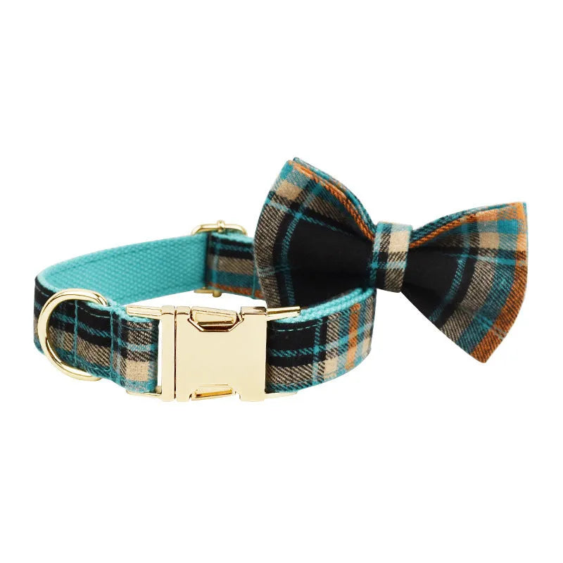 Green retro dog collar and leash four-piece set with matching vest and bow on cloth fabric