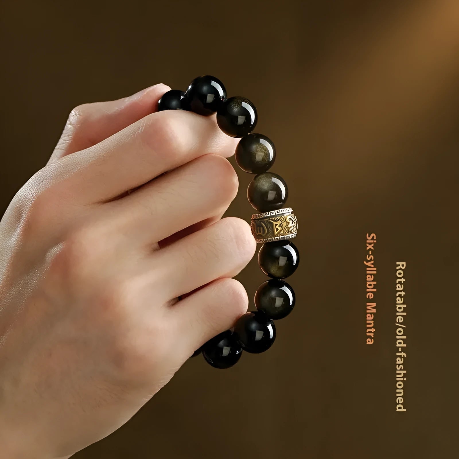 Natural cinnabar bead bracelet with a carved gold or silver animal charm in a gift box.