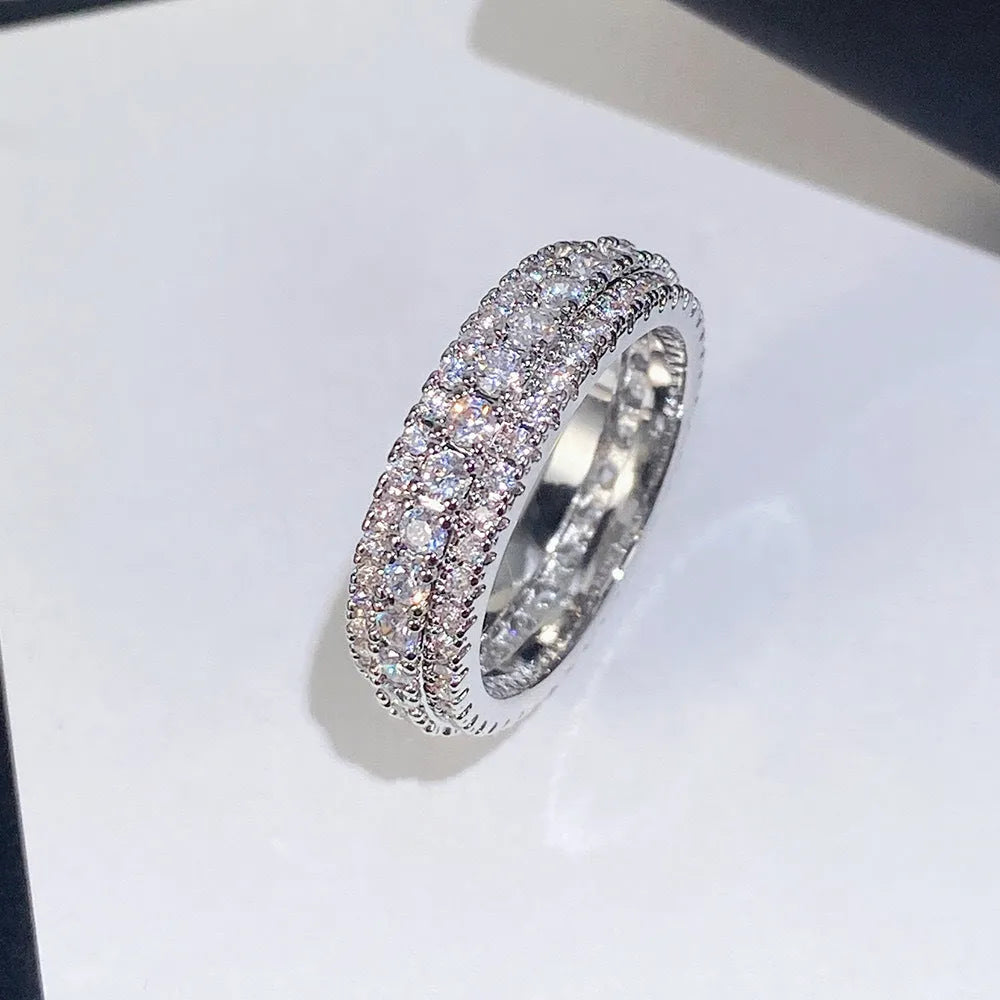 Personalised geometric copper ring with gang drill inlay and zircon stones in white gold finish.