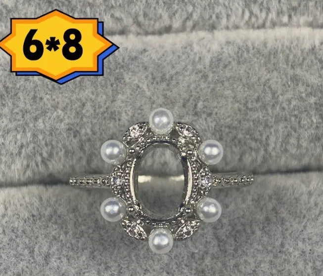 Oval denier ring with open mouth design, 6*8mm stone, and five-pointed star decoration
