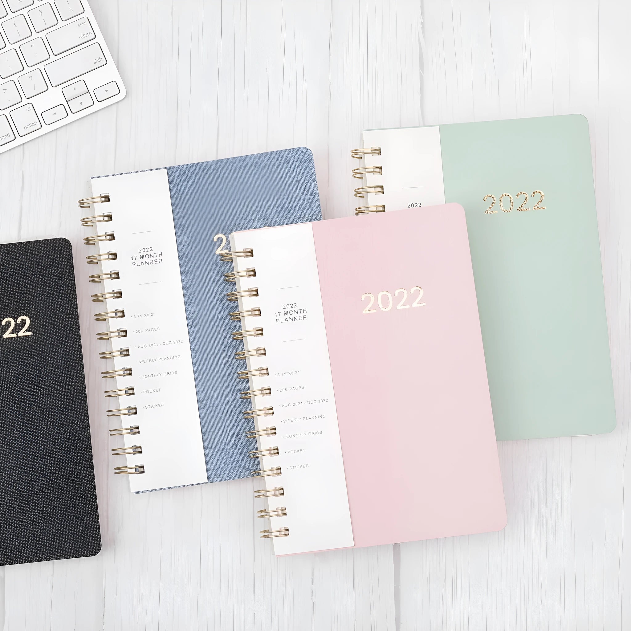 Blue and green 2022 student week planner notebook with PU leather cover showing 148 pages and storage pockets