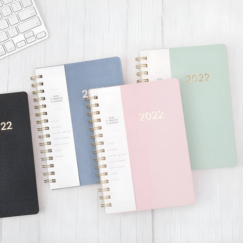 Blue and green 2022 student week planner notebook with PU leather cover showing 148 pages and storage pockets