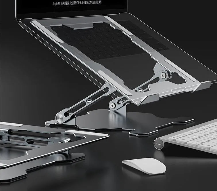 Grey aluminium laptop stand with adjustable angle, shown holding a silver laptop.