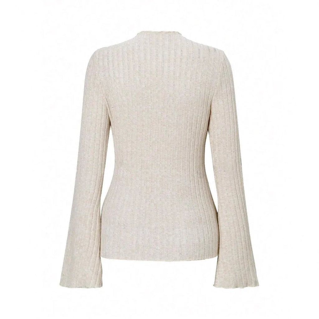 A man's black long sleeve top with a round neck and relaxed lantern sleeves in a slim fit.