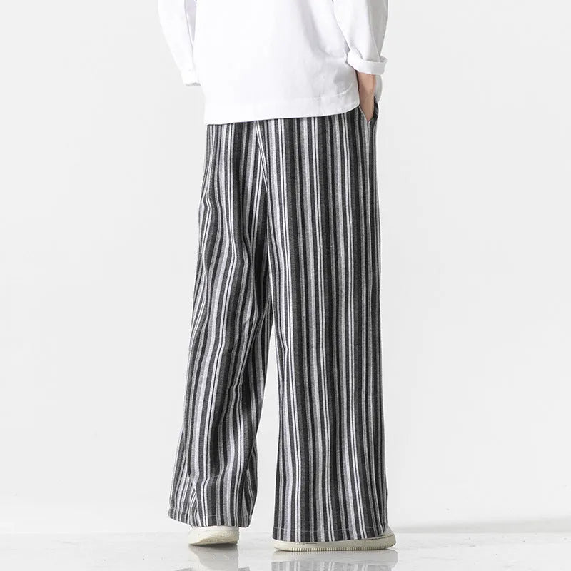 Vintage stripe loose straight leg mopping pants in cotton blend fabric on a hanger