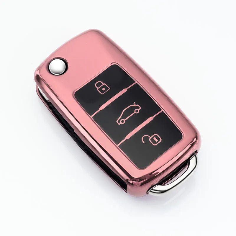 TPU single-shell protective cover for VW Model A folding car key, shown in silver, blue, pink, and red colour options.