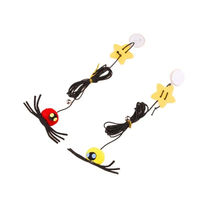 Red hanging door cat toy with elastic rope, feather, bell, and spider attachment