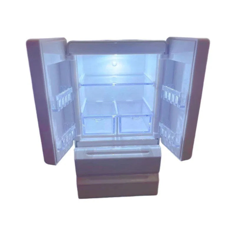 White plastic miniature candy toy model with light-up feature on display.