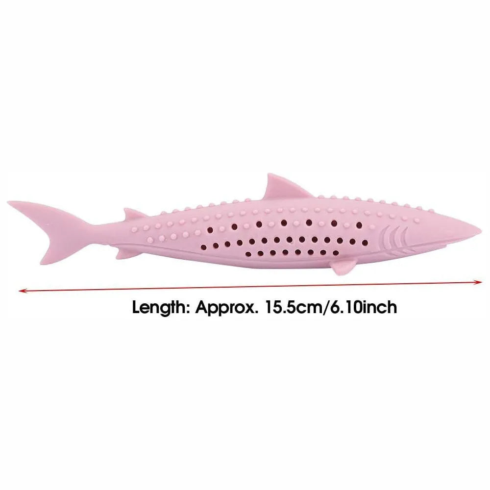 Green silicone fish-shaped chew toy for cats on a white background, showing breathable side holes.