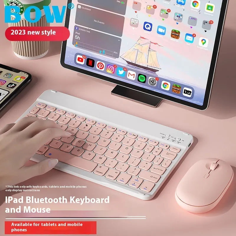 Girls Bluetooth keyboard in Lavender colour on a desk next to a tablet