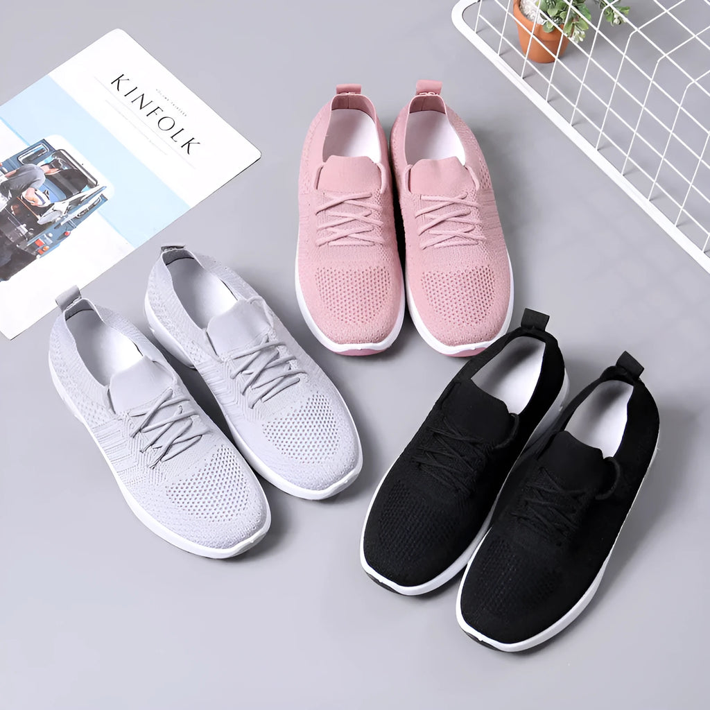 Women's casual lace-up sneaker with mesh upper and solid colour option