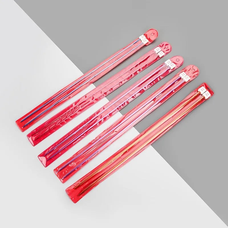 Set of lengthened crochet hooks with protective caps, showing hooks in various metric sizes from 2.0mm to 10.0mm.