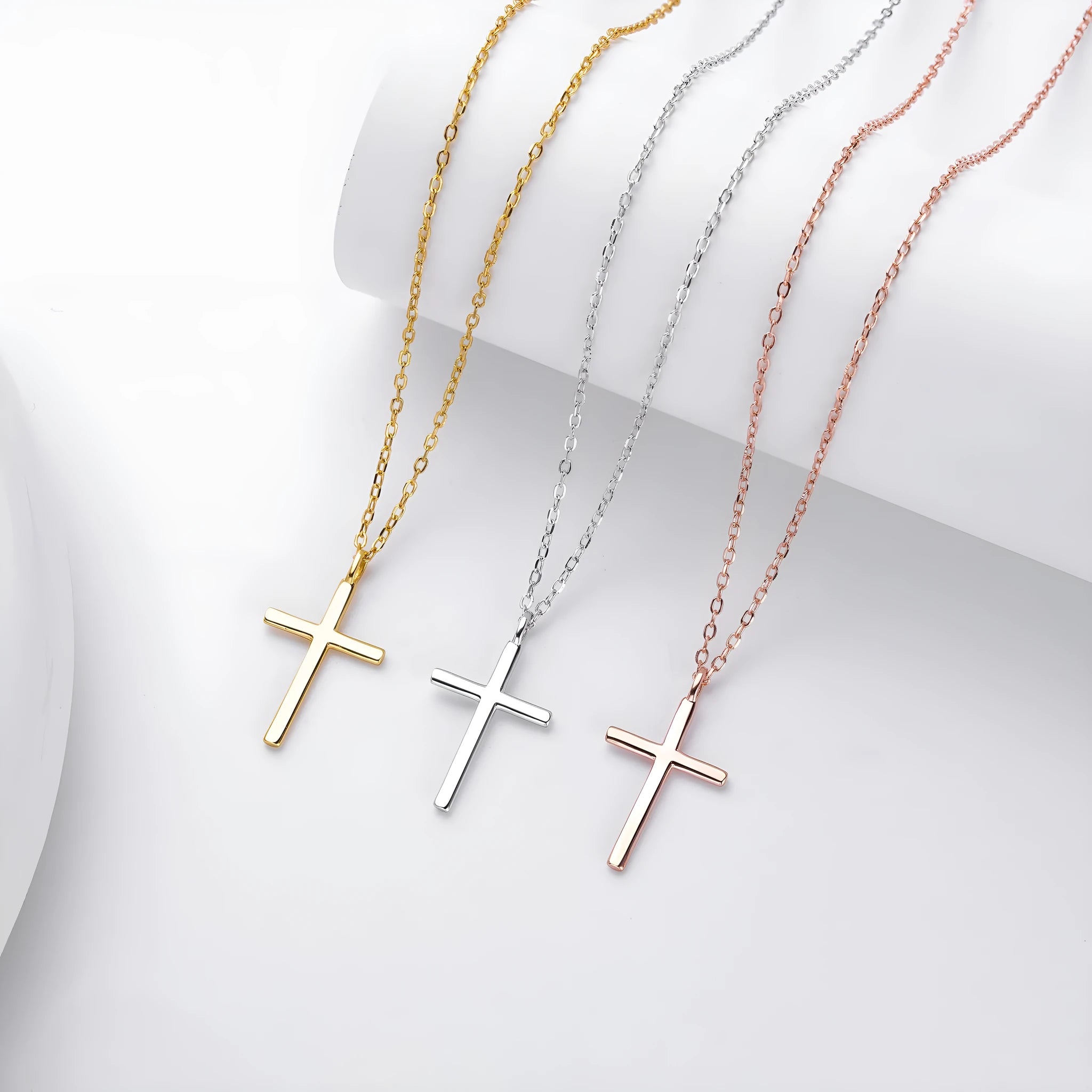 Sterling silver necklace with simple cross pendant on O-shaped chain in gold, platinum, or rose gold finish