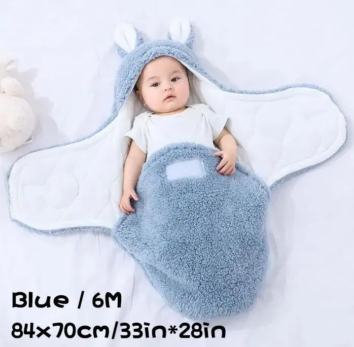 Fluffy fleece baby sleeping bag swaddle in blue with adjustable hook-and-loop closure for newborn