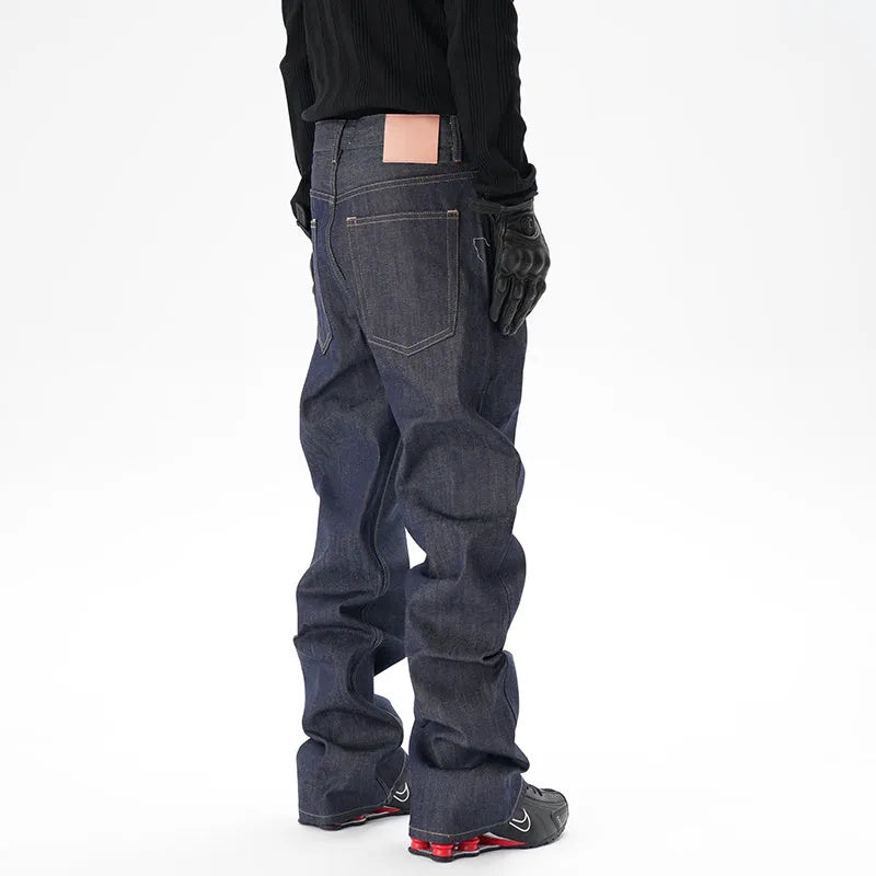 Men's dark blue loose straight leg jeans with original cattle wash on denim fabric
