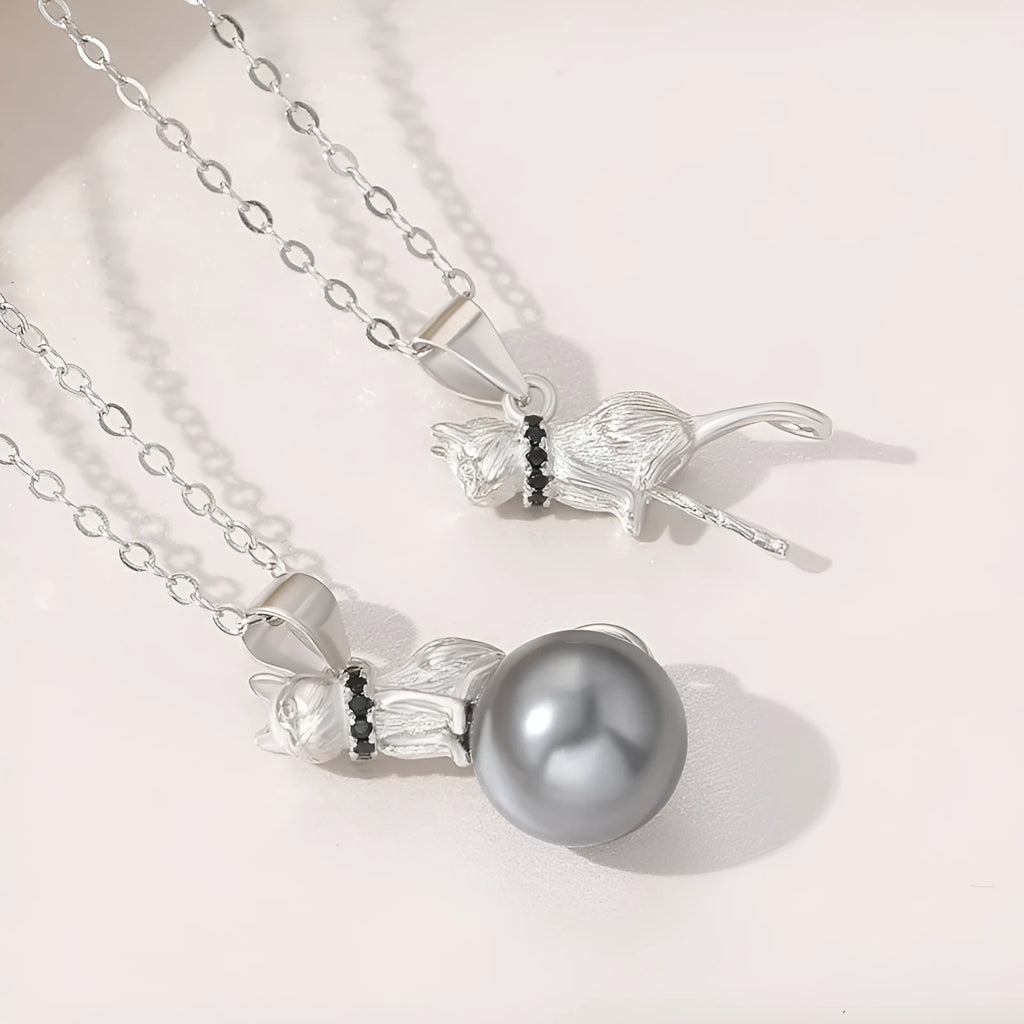 925 sterling silver cat pendant necklace on a clavicle-length chain, showing the detailed feline charm.