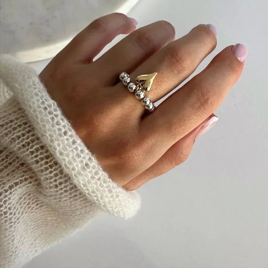 Handmade elastic beaded ring with love heart design in gold and silver electroplating