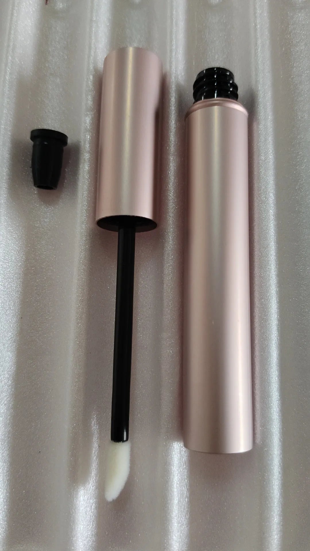 Aluminum tube 4ml cosmetic bottle with spray rose gold paint finish and black inner plug