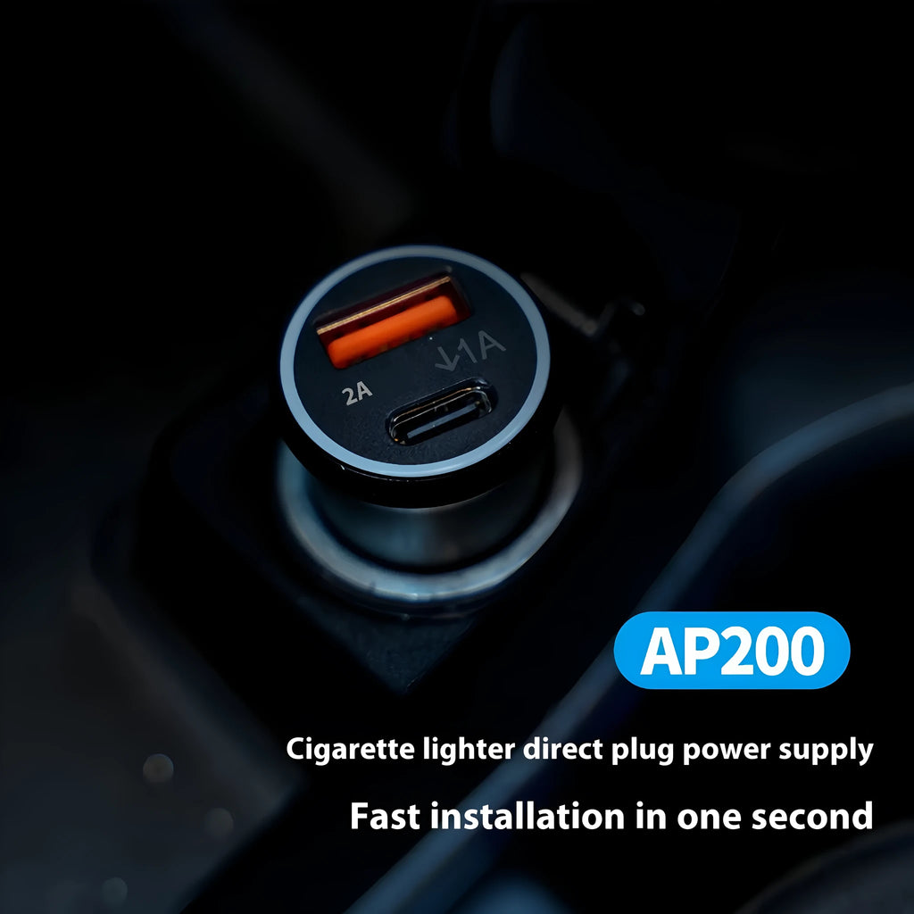 Black ABS plastic car charger locator GPS setting instrument on a dark surface.