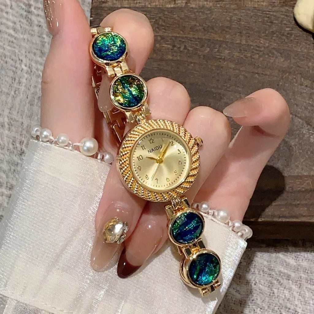 Women's quartz watch with 25mm round dial in six colour options showing spiral crown