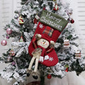 Three large Christmas stockings featuring Santa, Snowman and Reindeer designs with 3D applique decorations