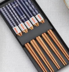 Set of five pairs of bamboo chopsticks with Japanese Lucky Cat and blue wave patterns in a gift box.