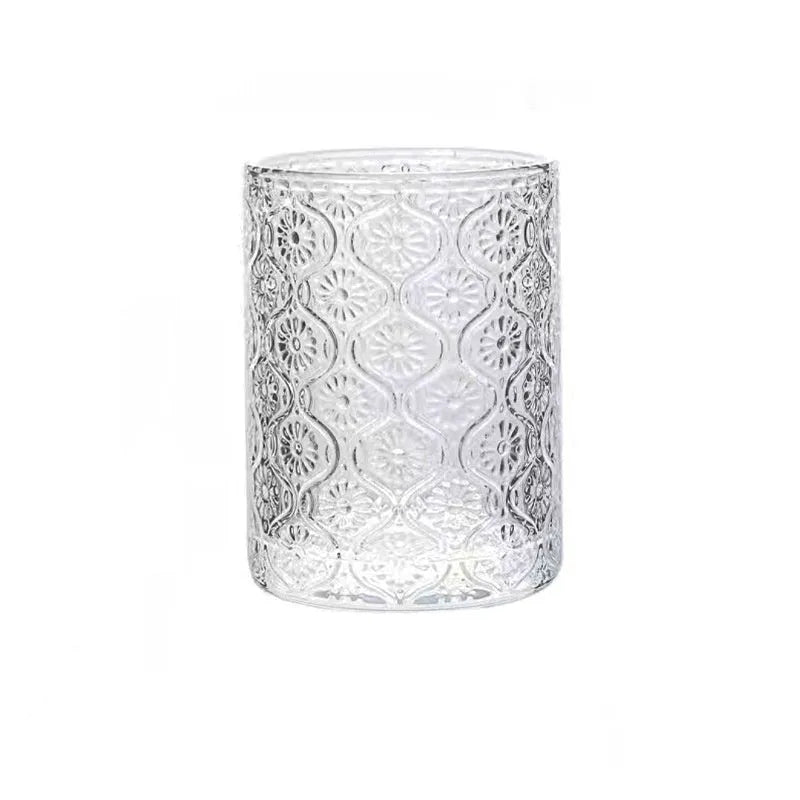 A begonia-carved straight round glass water cup in a solid colour, shown in short 250ml and tall 380ml sizes.