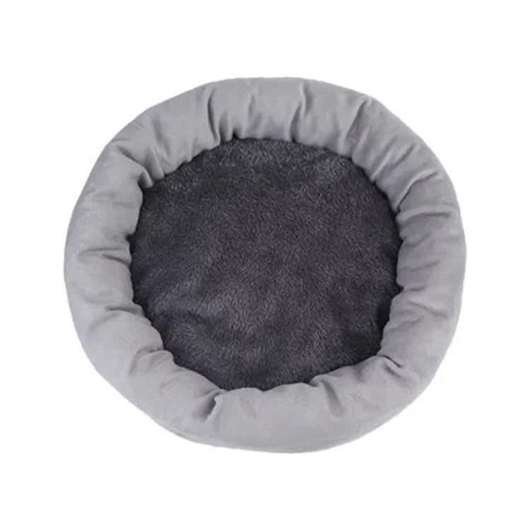 Circular light grey dog bed with PP cotton filling showing raised edges and optional pillow