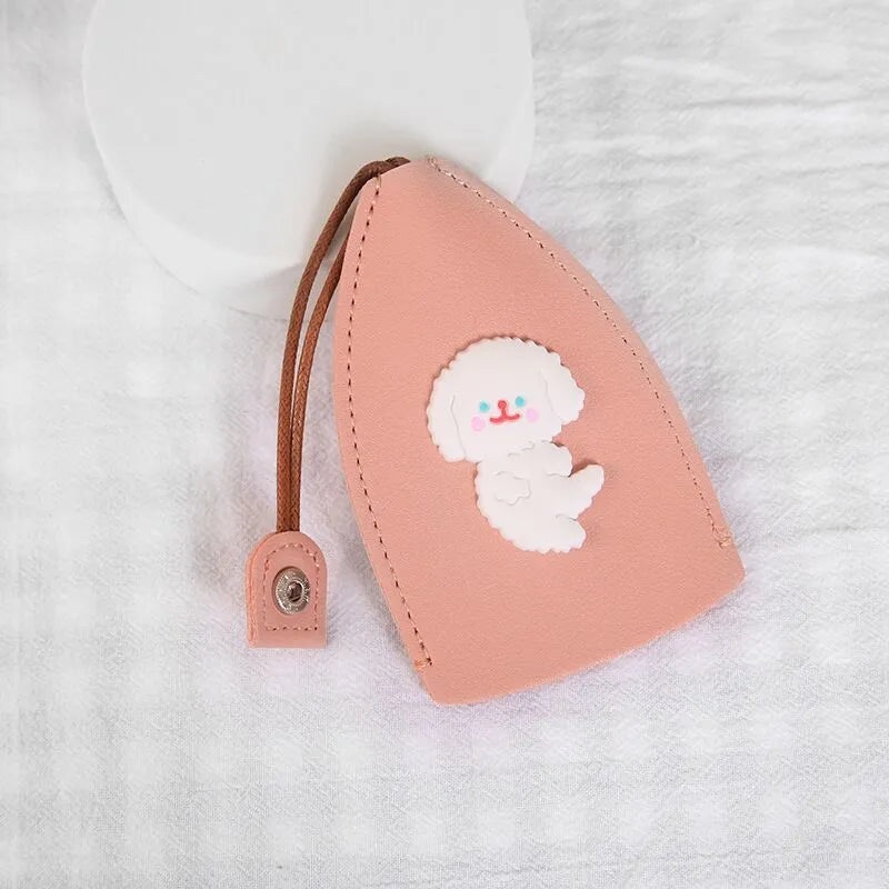 Cartoon pull-out key case in PU leather measuring 14 x 7.5 cm with colourful designs