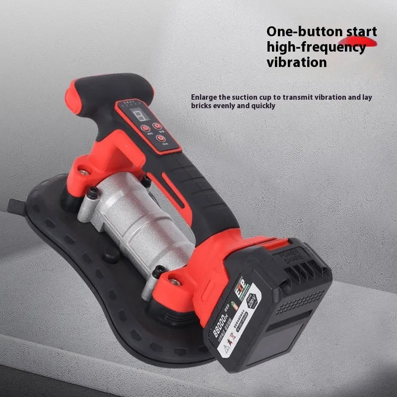 Cordless tile laying machine with battery, shown handling a large format tile