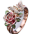 Adjustable butterfly personality ring with colourful oil drip treatment showing floral and insect design