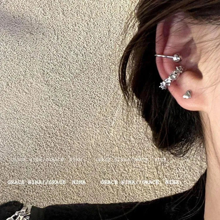 Geometric silver-tone alloy earrings with irregular frosty-style finish and ear clip fitting
