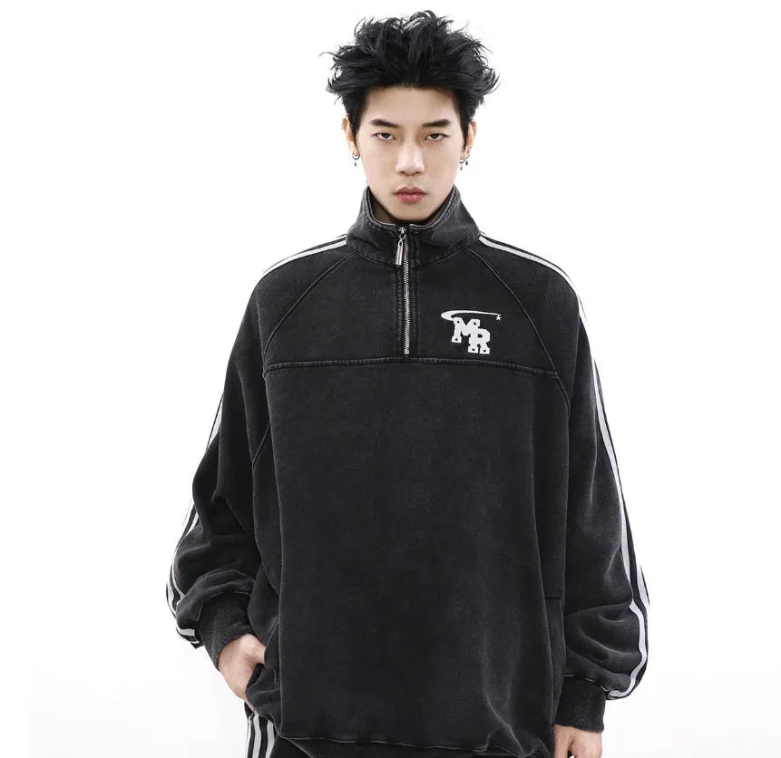 Black men's stand collar casual hoodie with long sleeves on a neutral background.
