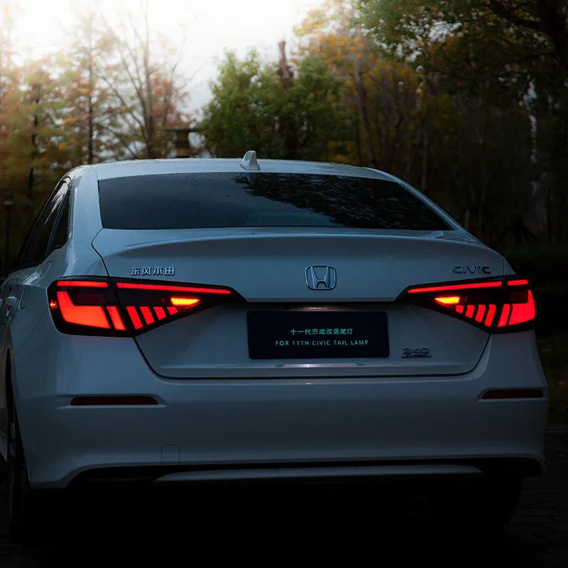 Black and red LED taillight assembly for 11th Generation Honda Civic with streamer indicators.