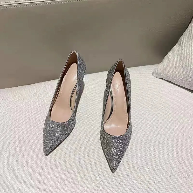 Women's silver and black stiletto wedding shoes with crystal detail on a 9cm heel.