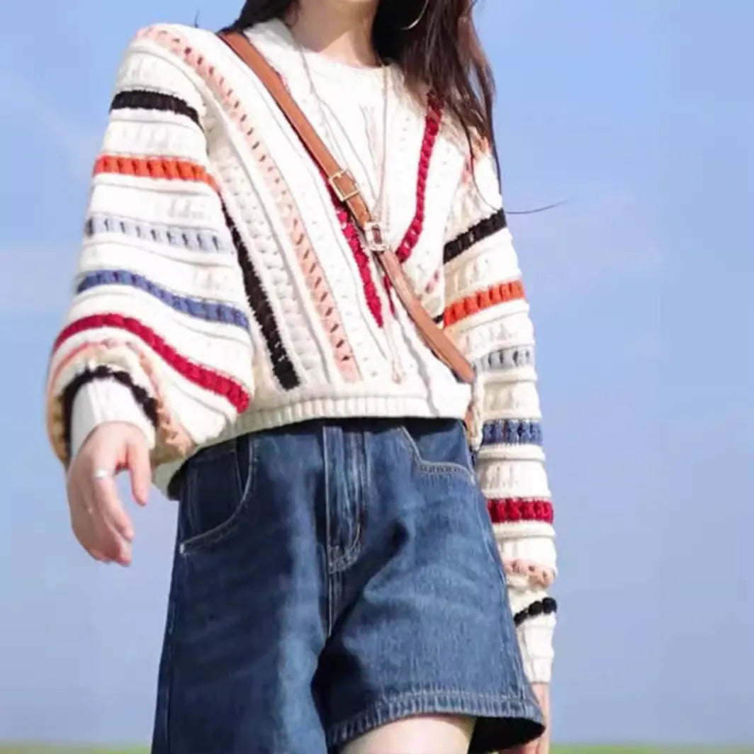 Rainbow striped round neck pullover sweater with batwing sleeves in loose fit casual style