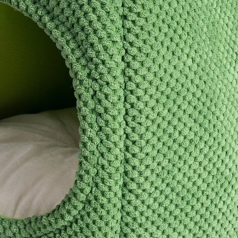 Green cactus-shaped enclosed cat bed for indoor pet sleeping