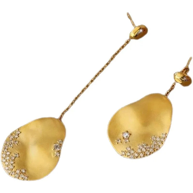 Asymmetric floral earrings with zircon stone centrepiece in gold or silver plating