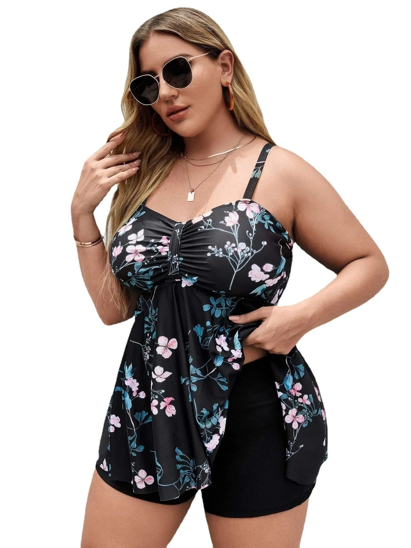 Women's floral print split colour one-piece swimsuit on a mannequin, showing front and back views.
