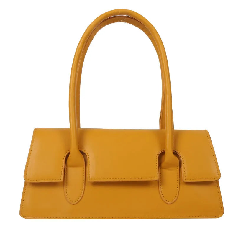 Women's small square shoulder bag in PU leather showing document compartment interior and stitching detail