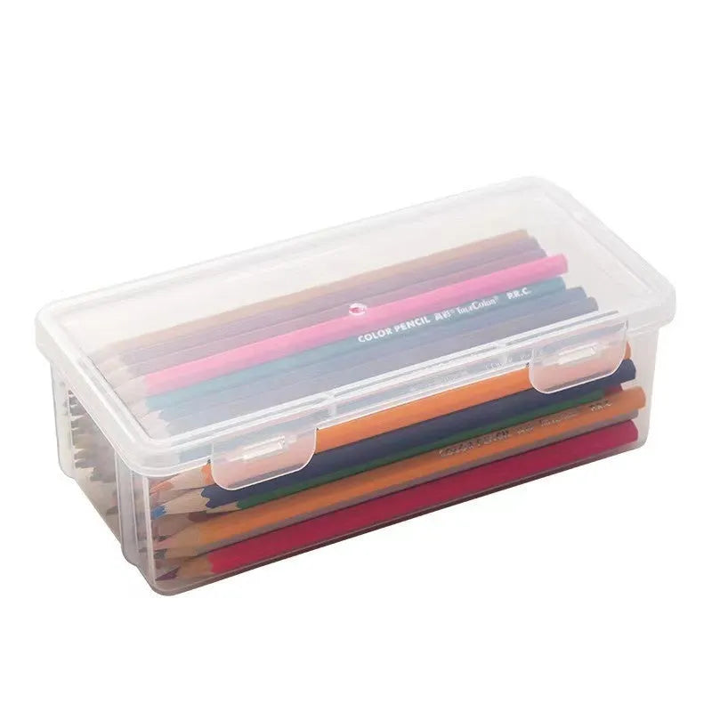 Transparent plastic pencil storage box showing interior space for organising stationery