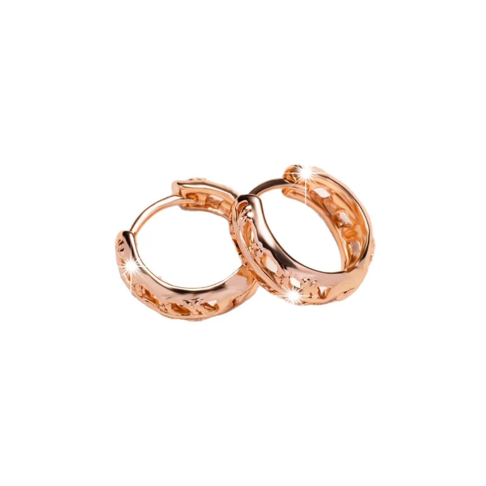 Rose gold copper earrings with hollowed-out leaf design featuring heart shape details