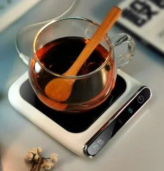Black USB coffee heater with tempered glass surface showing three temperature settings and drinking water reminder