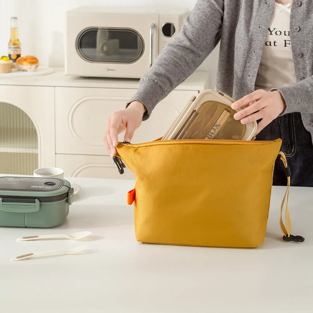 Japanese style insulated Oxford cloth lunch bag in Army Green colour showing wide opening.