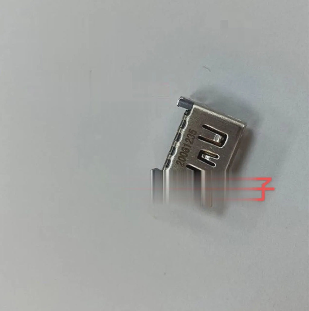Silver HDMI host interface socket for game console repair and signal connectivity.