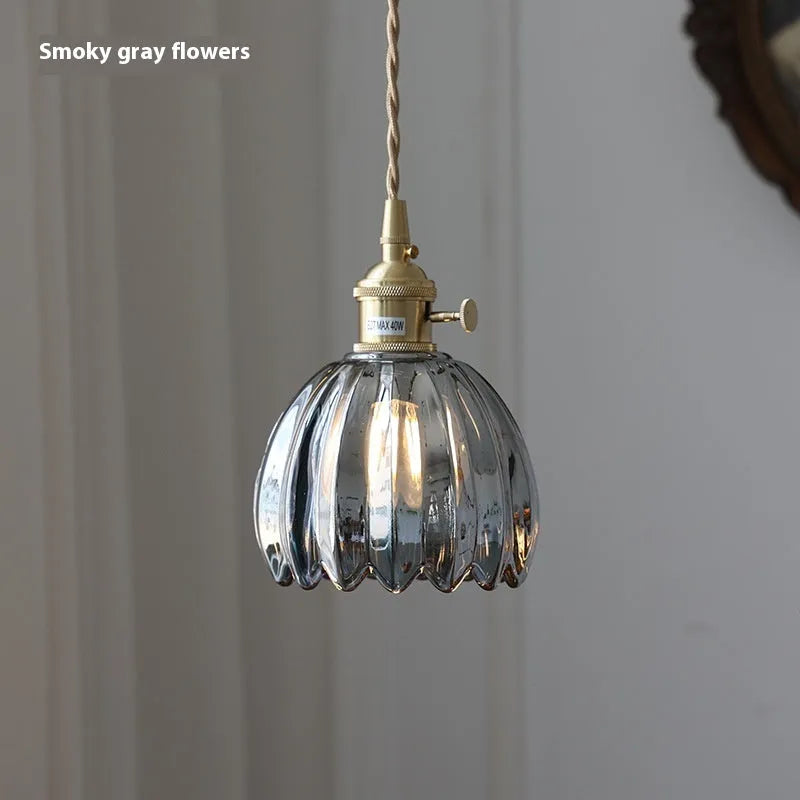 Vintage nordic style bedroom chandelier with glass flower shades in amber, green, grey, white, or transparent.