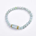 Natural Myanmar jade round beads bracelet in emerald green with ethnic geometric design