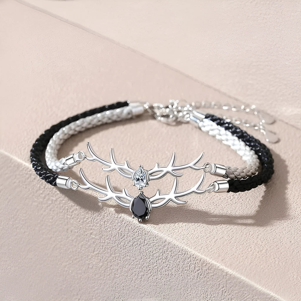 Yi Lu Has You braided rope bracelet in copper with animal zodiac design on display