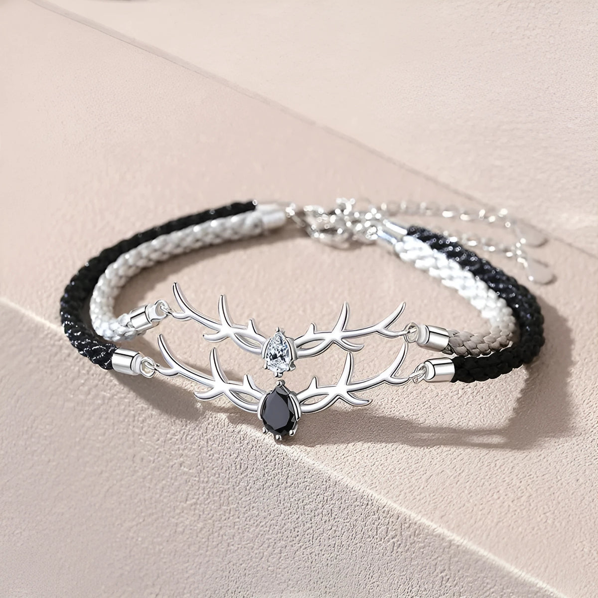 Yi Lu Has You braided rope bracelet in copper with animal zodiac design on display