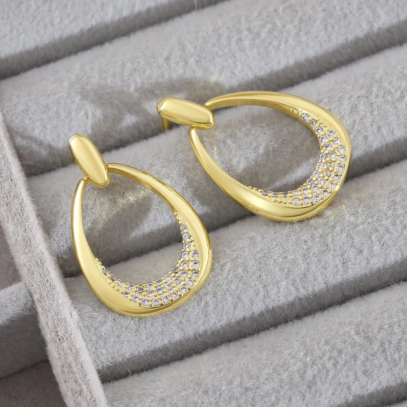 Yellow gold geometric ring drop earrings with electroplated finish on copper, 2.6 x 1.7 cm dimensions